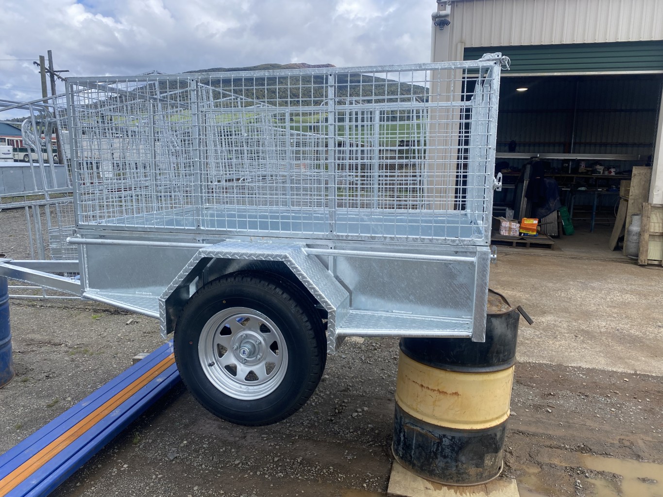 Trailer with cage attached